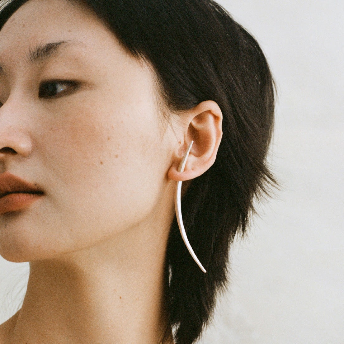 QIQI Long Arc Sprout Earring